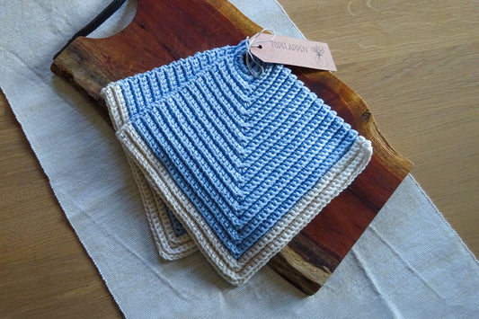 Hellblaue Baumwoll-Topflappen mit weißem Rand