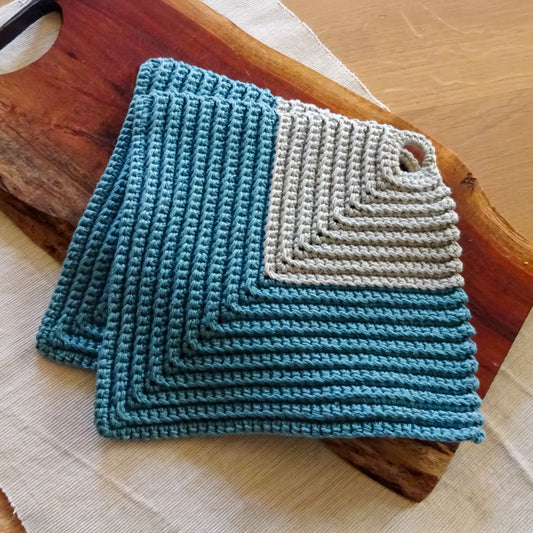 Blaue gehäkelte Topflappen aus Baumwolle