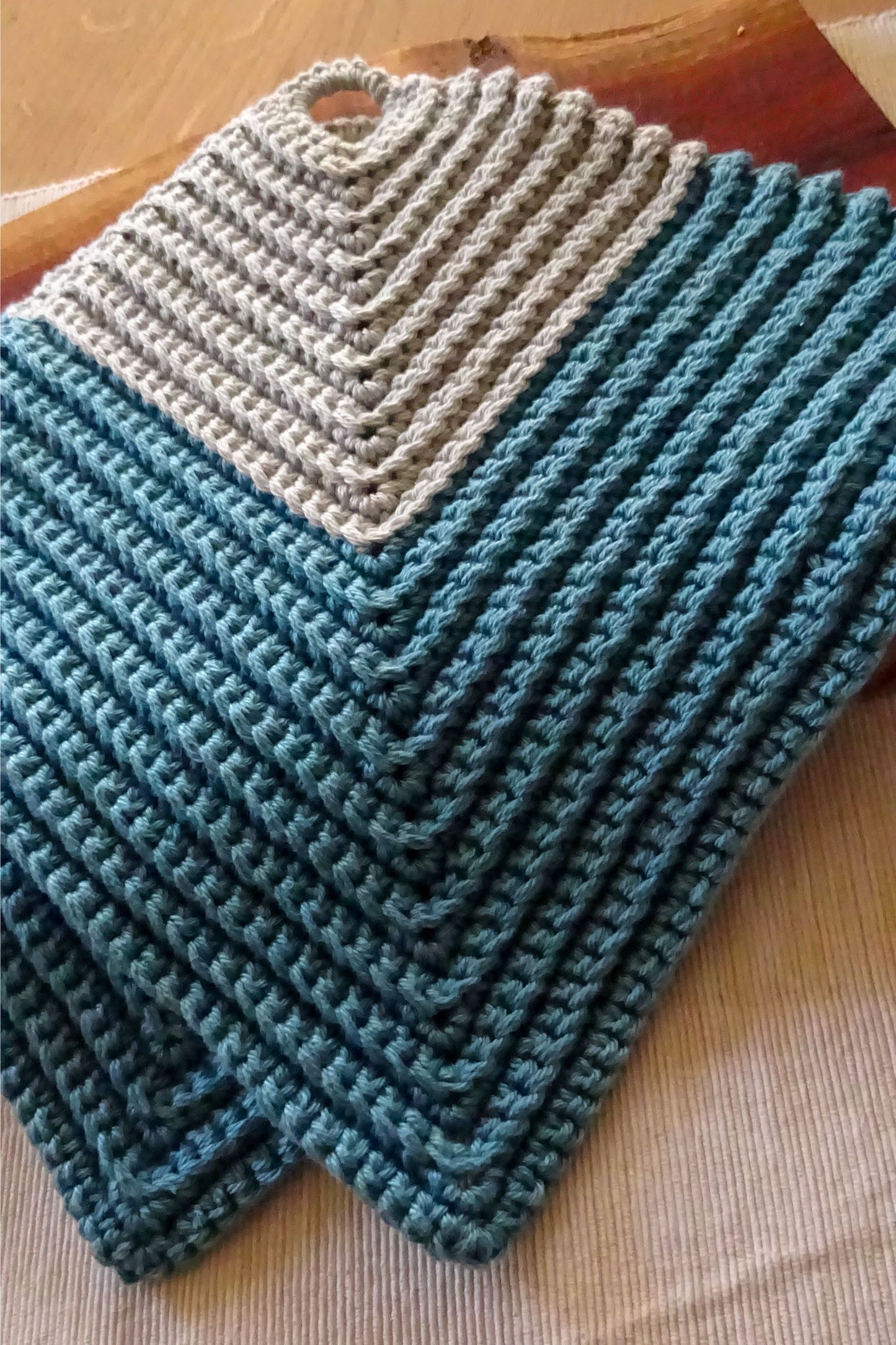 Blaue gehäkelte Topflappen aus Baumwolle